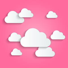 Paper clouds on pink background