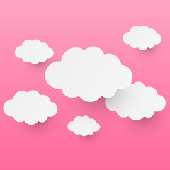 Paper clouds on pink background