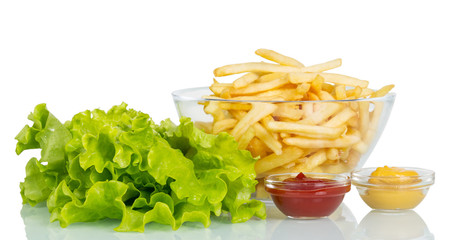 Lettuce,  bowl  French fries and sauces isolated on white background.