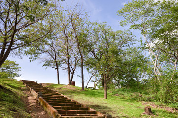 Stairs up the hill in the park within Leon Viejo - ruins of the old city of Leon, Nicaragua. The...