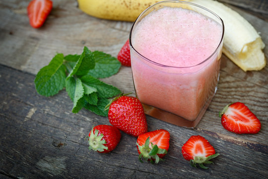 Strawberry- banana  smoothie in glass (healthy drink, beverage)