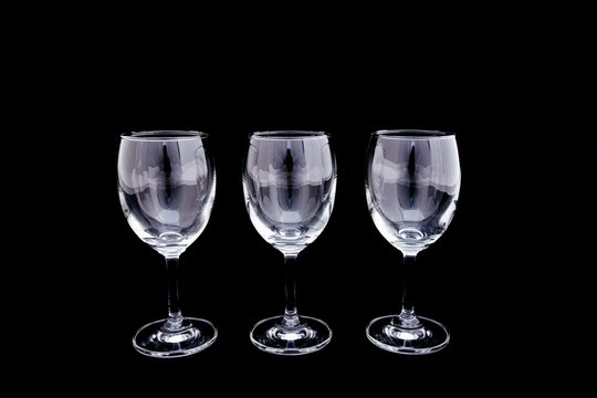 Group of empty wine Glass, Champagne Glass on black and copy space
