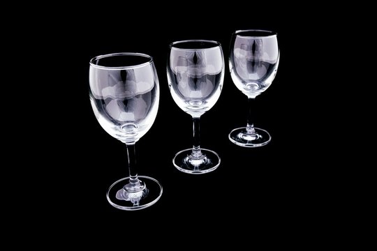 Group of empty wine Glass, Champagne Glass on black and copy space
