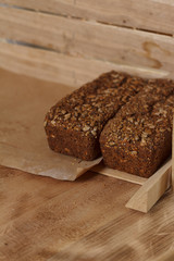 baked bread on wooden table background