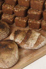 baked bread on wooden table background