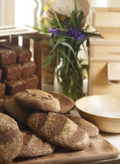 baked bread on wooden table background