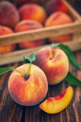 Fresh Peaches on Wooden Table