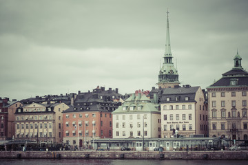Obraz premium Scenic panorama of the Old Town (Gamla Stan) pier architecture in Stockholm, Sweden