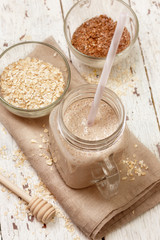 Smoothies with milk, oatmeal and flax seeds