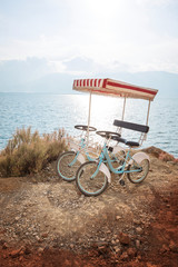 Pair bicycle beside the sea