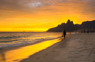 Sunset view of Ipanema beach and mountain Dois Irmao (Two Brother) in Rio de Janeiro, Brazil