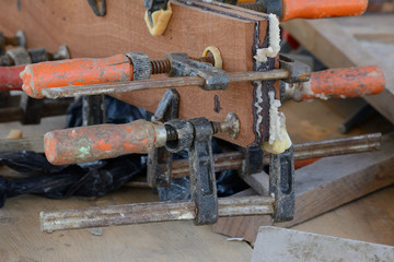 Clamps in work on a workbench