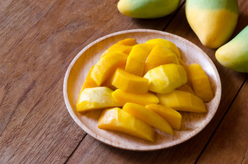 Mango,Mango fruit background,Mango dark tone,Mango on wood,Mango split