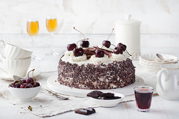 Black forest cake ,decorated with whipped cream and cherries Schwarzwald pie, dark chocolate and...