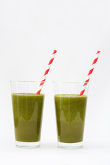 Healthy drink with spinach isolated on white background
