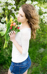 Woman with tulips / pretty woman with a bouquet tulips