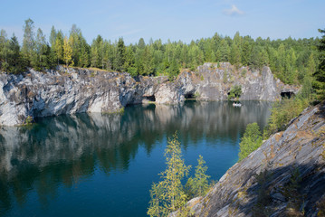 Fototapeta na wymiar Canyon and lake in situ mining of marble mines. Ruskeala, Karelia, Russia