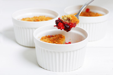 Crumbles with raspberries, gooseberries and blackberries