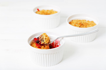 Crumbles with raspberries, gooseberries and blackberries