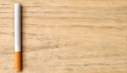 cigarette on a wooden table