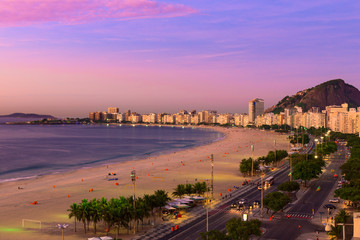 Sunrise view of Copacabana beach and Avenida Atlantica in Rio de Janeiro, Brazil
