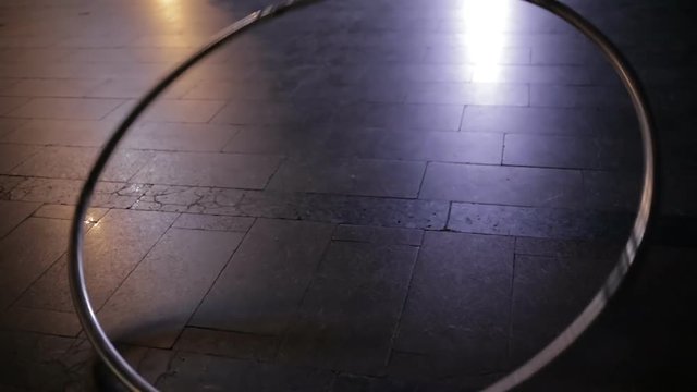 Big cyr wheel ring rolling on sidewalk