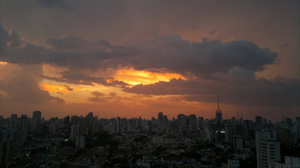 Fototapeta premium Sky over the city at sunset