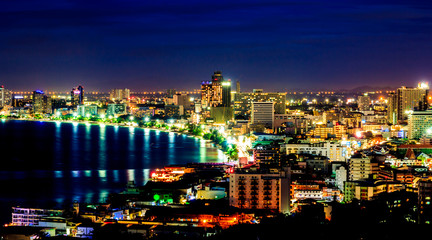 The building and skyscrapers in twilight time in Pattaya,Thailand. 
