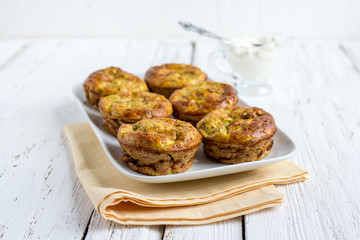 Zucchini muffins with herbs