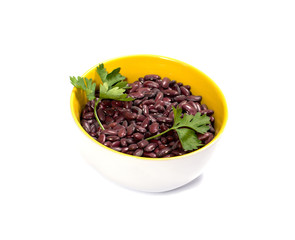 plate with raw haricot decorated with parsley