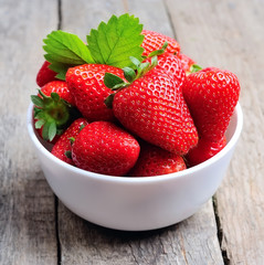 Ripe strawberry with leaves