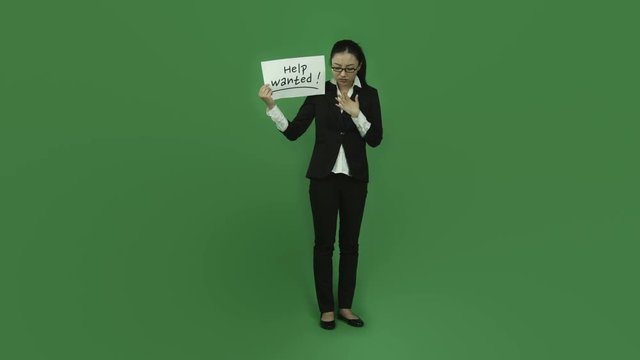 Asian business woman isolated greenscreen green background worried help wanted