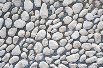 White pebble stone cemented floor, texture background