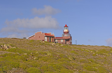 Fototapeta na wymiar Lighthouse on a Remote Island