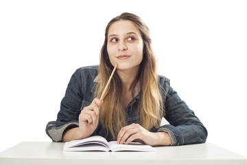 Obraz premium Thinking student girl on isolated background