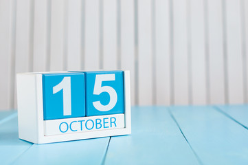 October 15th. Image of October 15 wooden color calendar on white background. Autumn day. Empty...