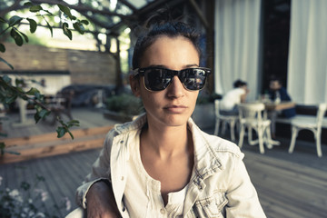 Close up of young girl with sunglasses