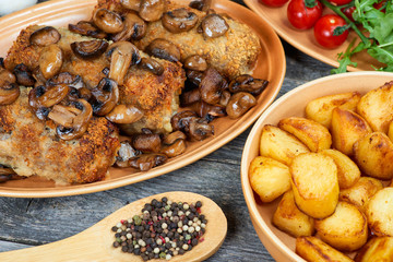 roulade of pork with roasted mushrooms and potatoes