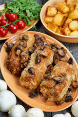 roulade of pork with roasted mushrooms and potatoes