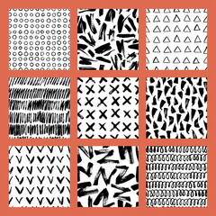 Set of hand-drawn seamless brush strokes patterns.