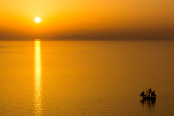 Fototapeta na wymiar Sunset in Town of Oia, Santorini, Tira Island, Cyclades