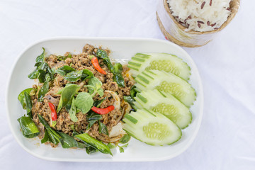 Spicy duck salad with vegetables and chillies what we called Larb Ped in Thai style local the northeastern delicious food of Thailand.