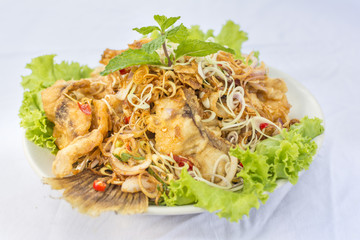 Deep fried  ruby fish fried spicy with Thai Herb delicious Thai food.