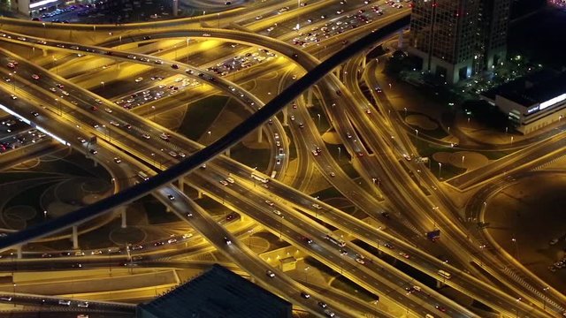 Cinemagraph. Dubai downtown traffic at night, United Arab Emirates. View on Sheikh Zayed road from 124th floor of Burj Khalifa skyscraper in Dubai, currently tallest structure in the world, 829m