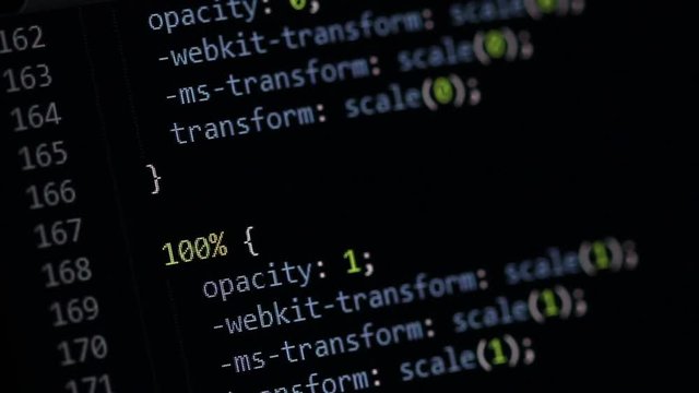 Scrolling through websites' CSS code in a dark color-schemed editor window. Cascading style sheet scrolling stops from time to time.