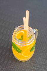 Fresh summer orange lemonade with mint
