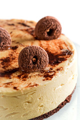 Biscuit cake with the whole cookies on a white background
