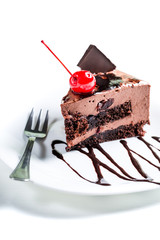 Chocolate cake with cherry isolated on white background