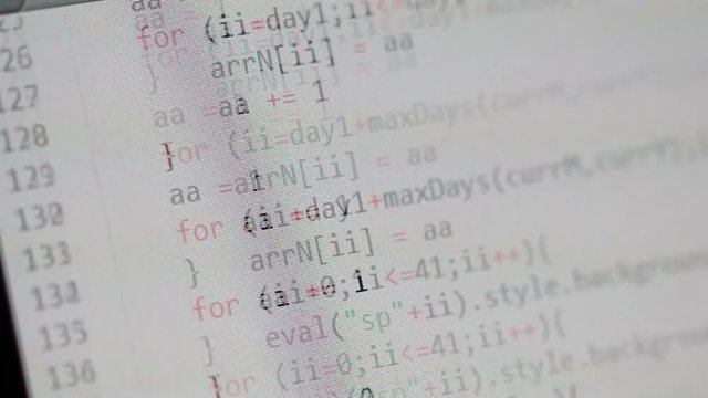 Scrolling through several JavaScript functions in a white background code editor. Shot under a slight angle and with a shallow depth of field.