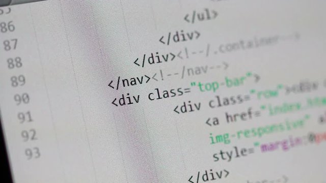 Scrolling through a page of HTML code in a light-color code editor window. Scrolling stops from time to time to show some of the HTML tags